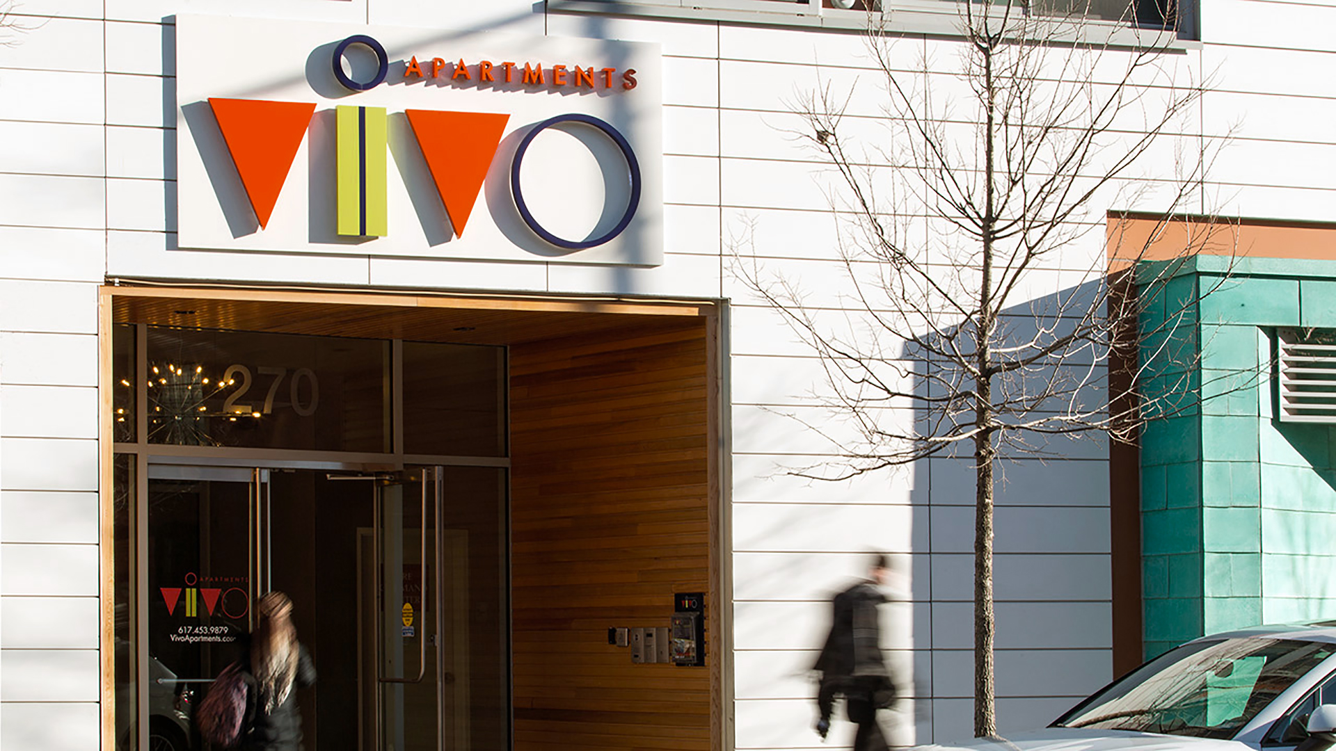 vivo building signage with man walking